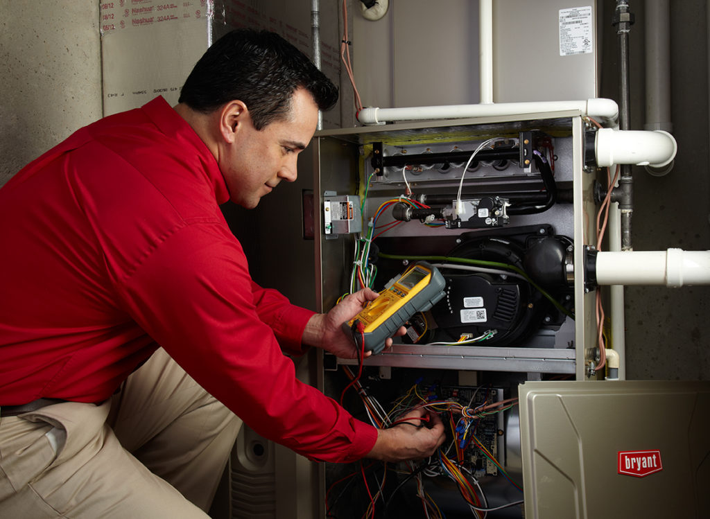 HVAC Specialist installing Bryant unit